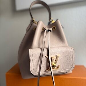 Louis Vuitton Beige Shoulder Bag with Gold Accents